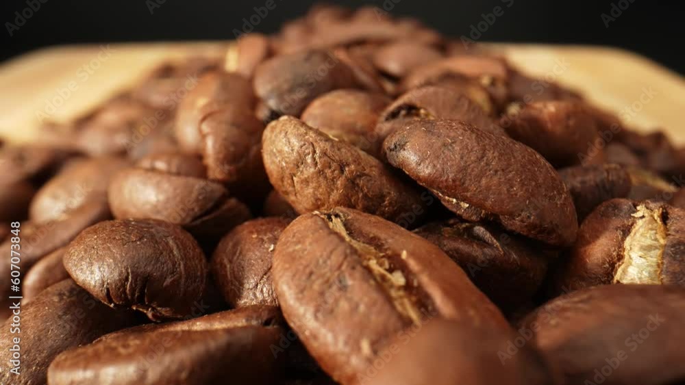 Immerse yourself in a sensory journey as macro videography unveils the hidden beauty of coffee beans, showcasing their delicate patterns and captivating details. Brown background video. 4K
Immerse yourself in a sensory journey as macro videography unveils the hidden beauty of coffee beans, showcasing their delicate patterns and captivating details. Brown background video. 4K