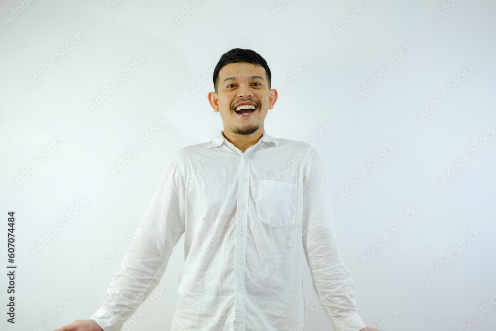 adult Asian man showing happy and enthusiastic expression over white background adult Asian man showing happy and enthusiastic expression over white background