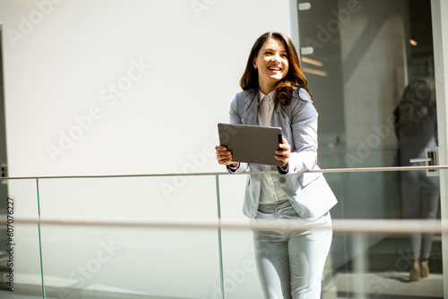 Young woman working on digi...