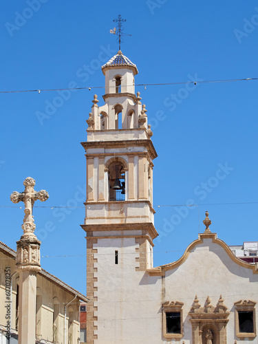 Bell tower and facade of the church of San Antonio de Padua (Saint Anthony of Padova). Denia, Costa Blanca, Alicante, Comunidad de Valencia, Spain, Europe photo