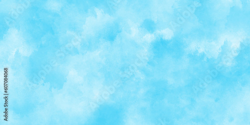 Brush-painted blurred and grainy paint aquarelle Abstract light sky blue watercolor background,  blurred and grainy Blue powder explosion on white background, Classic brush painted Blue sky.