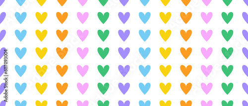 Colorful Hearts Seamless Vector Pattern. Cool Simple Print with Hand Drawn Love Symbol ideal for Fabric, Textile, Wrapping Paper. Rainbow Colors Hearts Isolated on a White Background. RGB Color.