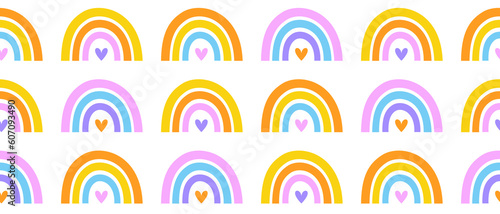 Colorful Rainbow Seamless Vector Pattern. Irregular Hand Drawn Simple Nursery Print ideal for Fabric,Textile,Wrapping Paper. Rainbow and Hearts Isolated on a White Background.