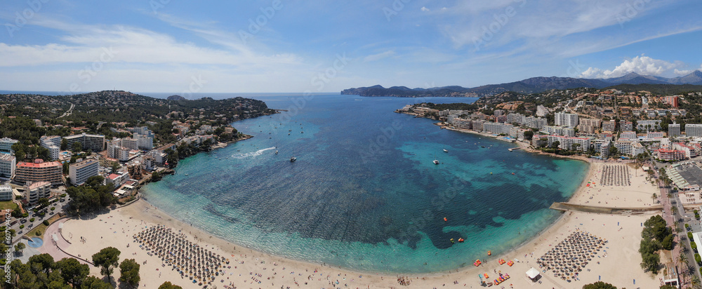 Naklejka premium Panoramic view of Santa Ponsa in Majorca island. Beautiful scene of the seacost with a blue sea and Mediterranean landscape