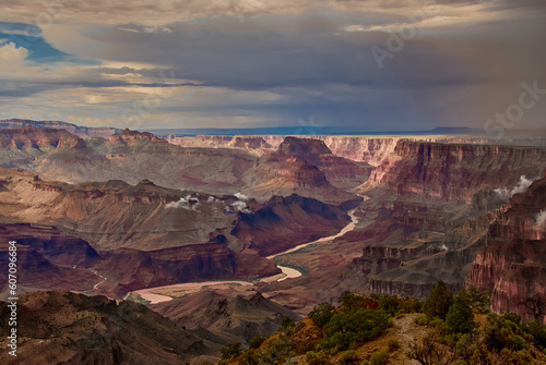 The Colorado River seen in the late afternoon light on a stormy summer day at Navajo Point on the south rim of the Grand Canyon, Arizona, USA.