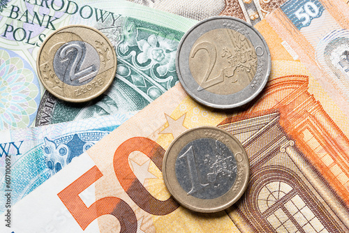 polisch currency zloty and euro currency coins and banknotes