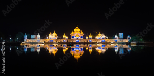 multi-photo panorama, night view, sacred place kusum sarovar on govardhan hill, temple in india, place of pilgrimage