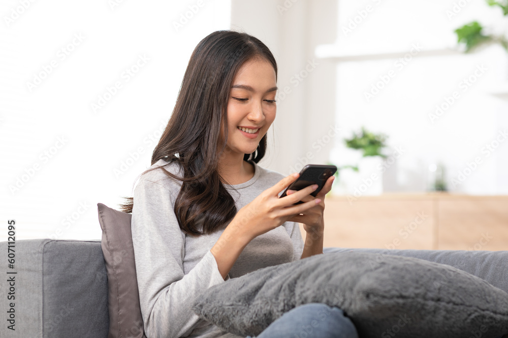 Happiness Entrepreneur beautiful business asian young woman wear casual use mobile phone for shopping online enjoy with social media and laptop at home.Small Business Startup.online banking Happiness Entrepreneur beautiful business asian young woman wear casual use mobile phone for shopping online enjoy with social media and laptop at home.Small Business Startup.online banking