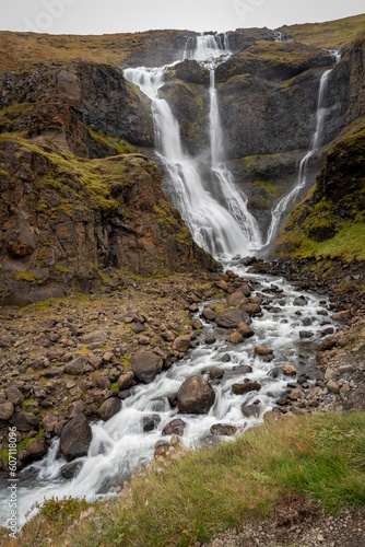 View of Rjúkandi waterfall aka Rjukandafoss in Jokuldalur valley at northeast Iceland.