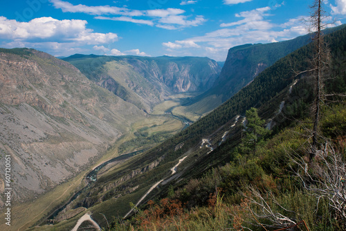 Panorama of the Katu Yaryk mountain pass and the valley of the river of Chulyshman. Altai Republic  Russia  beautiful summer day