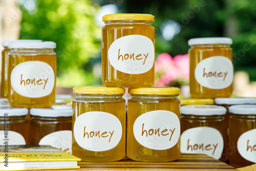 Honey collected from bees, bees give honey, honey in jars, bees work in the hive, hardworking bees make healthy honey, health, healing