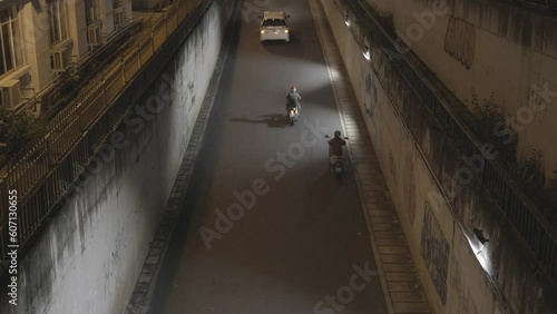 Vehicles passthrough under passing bridge at night 4k