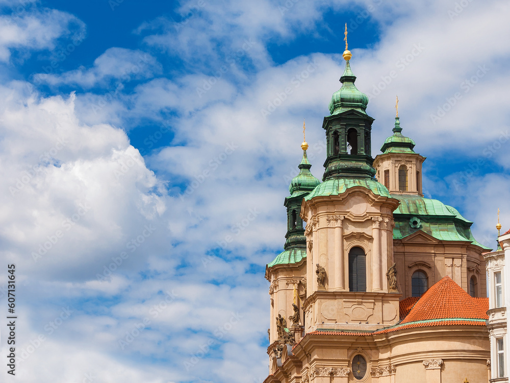 Fototapeta premium Baroque art and architecture in Prague. Church of Saint Nicholas beautiful dome and twin bell towers erected in 18th centuty in Stare Mesto (Old Town) district