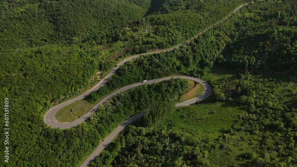 car drive on asphalt road in mountain range in spring travel concept car drive on asphalt road in mountain range in spring travel concept