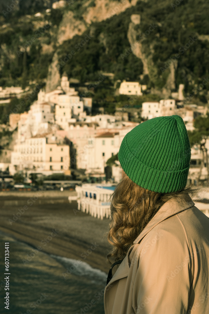 The girl with a hat, watching the Amalfi sunrise