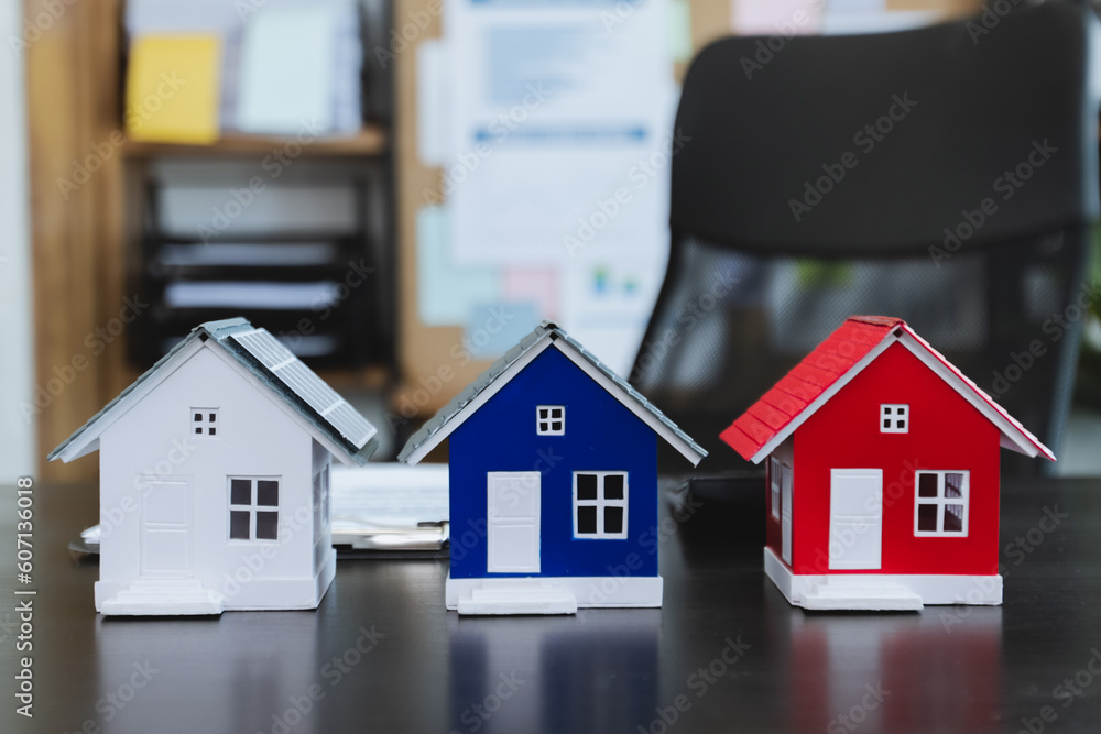House model real estate agent and customer discussing for contract concept. House model real estate agent and customer discussing for contract concept.