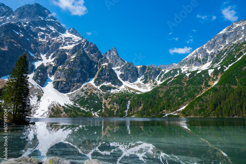 beautiful landscape view of Lake Morskie Oko in the mountains with clear water and reflection in Zakopane Poland in the Tatra National Park