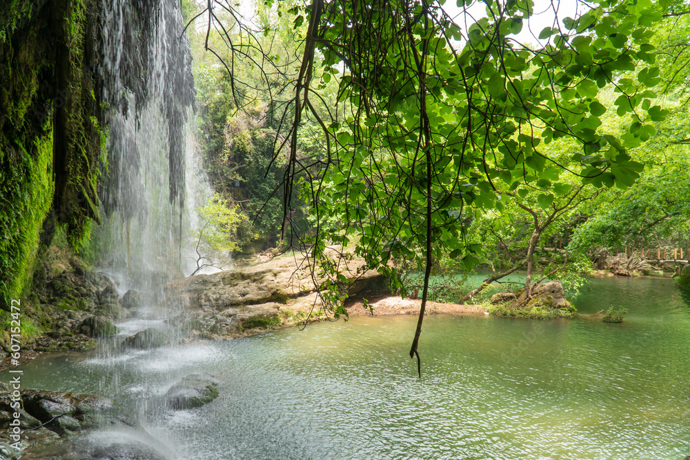 Naklejka premium waterfall in the forest. Kursunlu Waterfalls in Antalya, Türkiye. selective focus