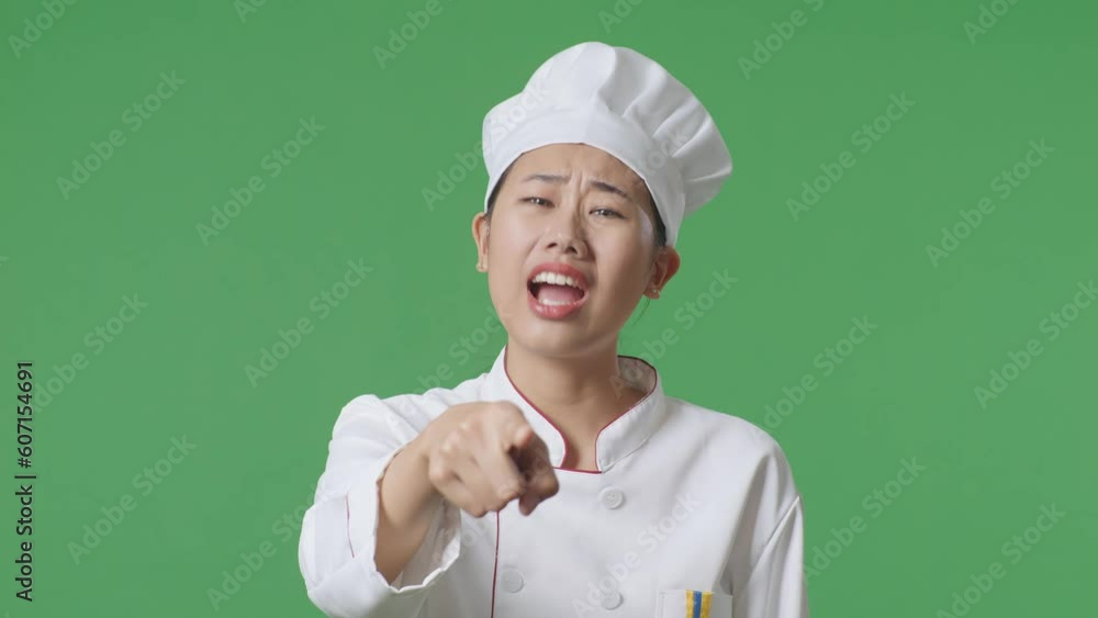 Close Up Of Asian Woman Chef Shouting To Camera While Standing In The Green Screen Background Studio
Close Up Of Asian Woman Chef Shouting To Camera While Standing In The Green Screen Background Studio