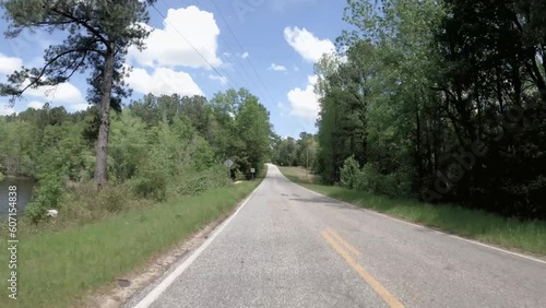 Rear POV FPV driving on a rural country road in the spring in Georgia USA