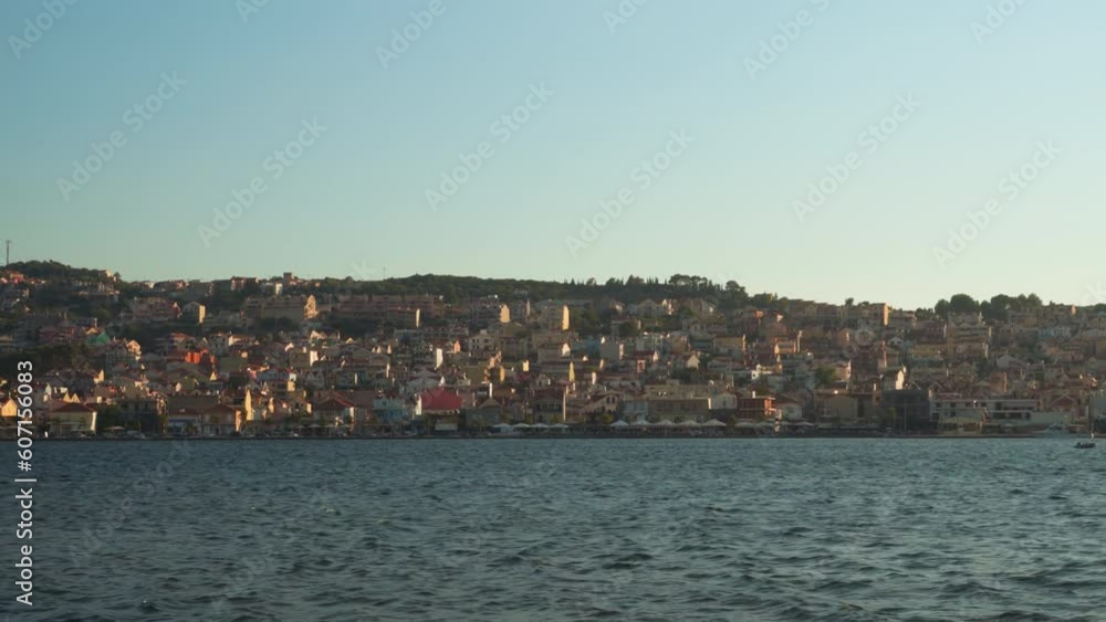 Argostoli town seafront panorama with low-rise buildings on the Ionian Island of Cephalonia Greece. Argostoli town seafront panorama with low-rise buildings on the Ionian Island of Cephalonia Greece.