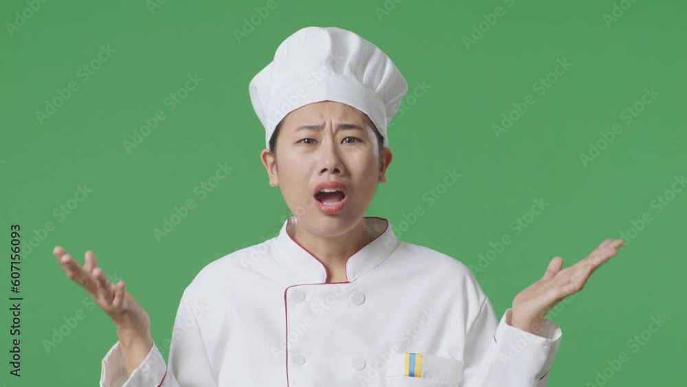 Close Up Of Wondering Asian Woman Chef Saying Why And Standing Doubtfully In The Green Screen Background Studio
Close Up Of Wondering Asian Woman Chef Saying Why And Standing Doubtfully In The Green Screen Background Studio