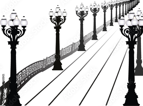 street lapms and fence near road