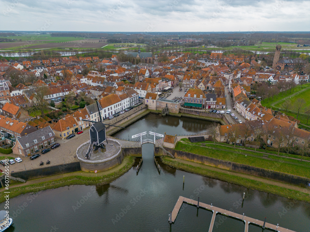 An aerial drone photo of the town centre and old dutch mill in Heusden