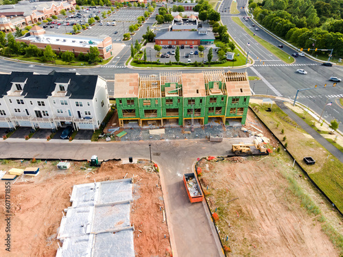 Apartment building under construction top view. Construction site in a small American town.