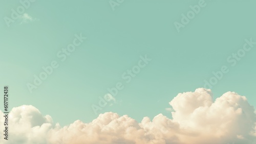 Beautiful sky on colorful gentle light day background. Sunny and fluffy clouds with pastel tone and idyllic teal agreen color backdrop. Picturesque photo