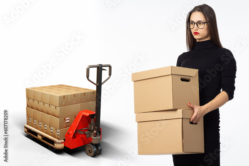 Businesswoman with boxes. W...