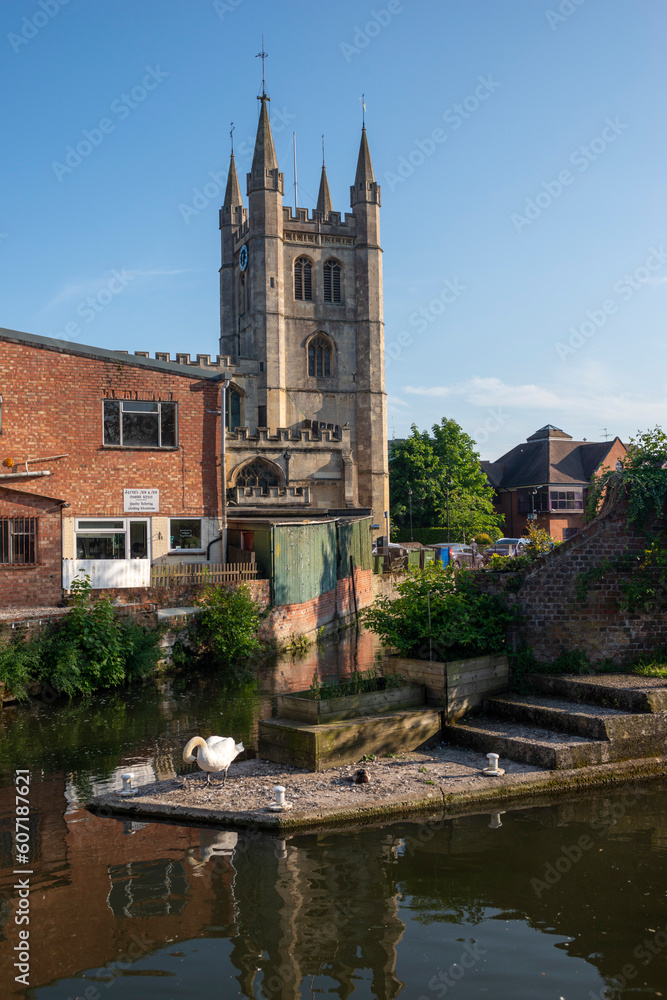 St Nicolas Church, Newbury.  Seen from across the canal, with swan