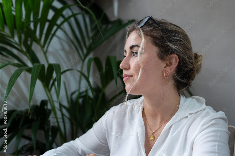 Serious young caucasian business woman head shot portrait. Thoughtful millennial businesswoman looking away with pensive face, dreaming, thinking over project tasks, problem solving.