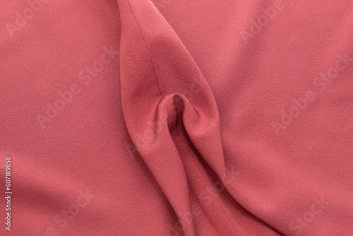 Female genital organs, vulva, vagina, delicate pink fabric sculpture,  artistic depiction of feminine forms photo