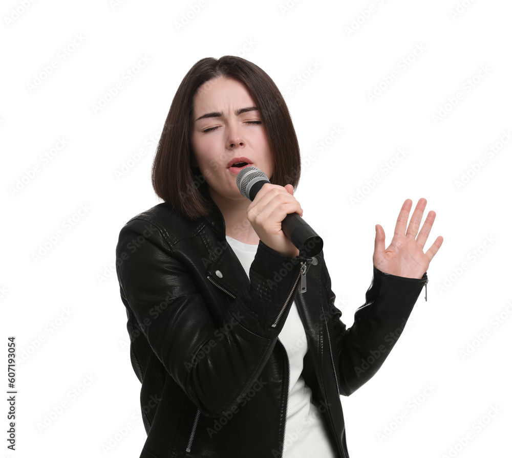 Beautiful young woman with microphone singing on white background Beautiful young woman with microphone singing on white background