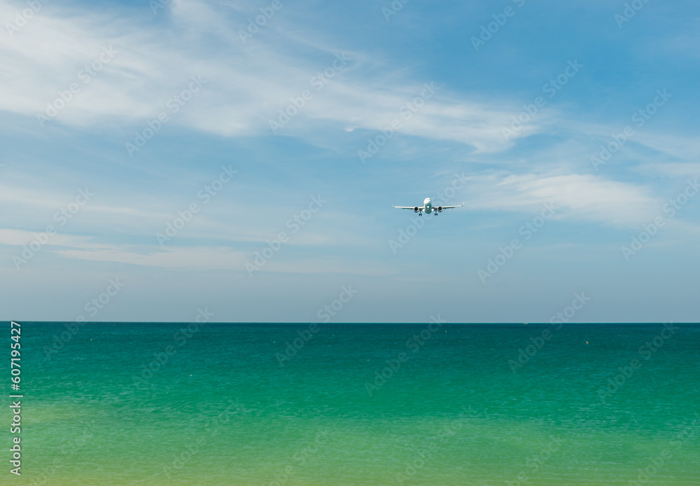 Airplane flying at sky, Airliner passing blue sky, copy space