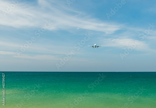 Airplane flying at sky, Airliner passing blue sky, copy space
