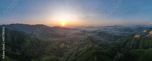 Panoramic view above the clouds. Aerial Mountains nature fog cloud sunlight outdoors motion beauty.