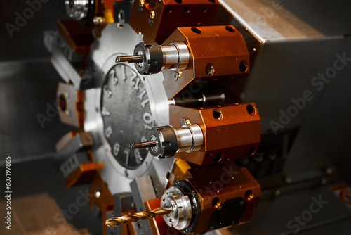 Fotografie Capstan head with drill of lathe machine tool at factory