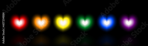Hearts gradient blur multi-colors on black background. Red, Orange, Yellow, Green, Blue, and Purple. Vector illustration.
