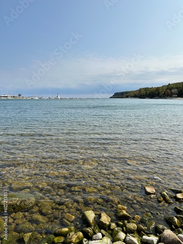 Wavy lake with clear water | Rocky shore | Portrait Orientation |