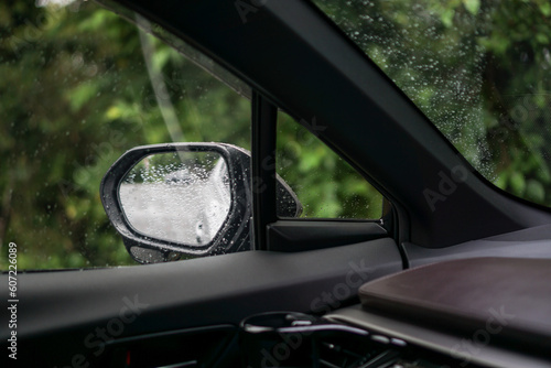 雨の日の水滴のついた車のサイドミラー © Kazu8
