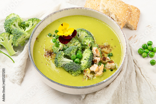 Green soup. Broccoli cream soup. Healthy vegan dish. Top view