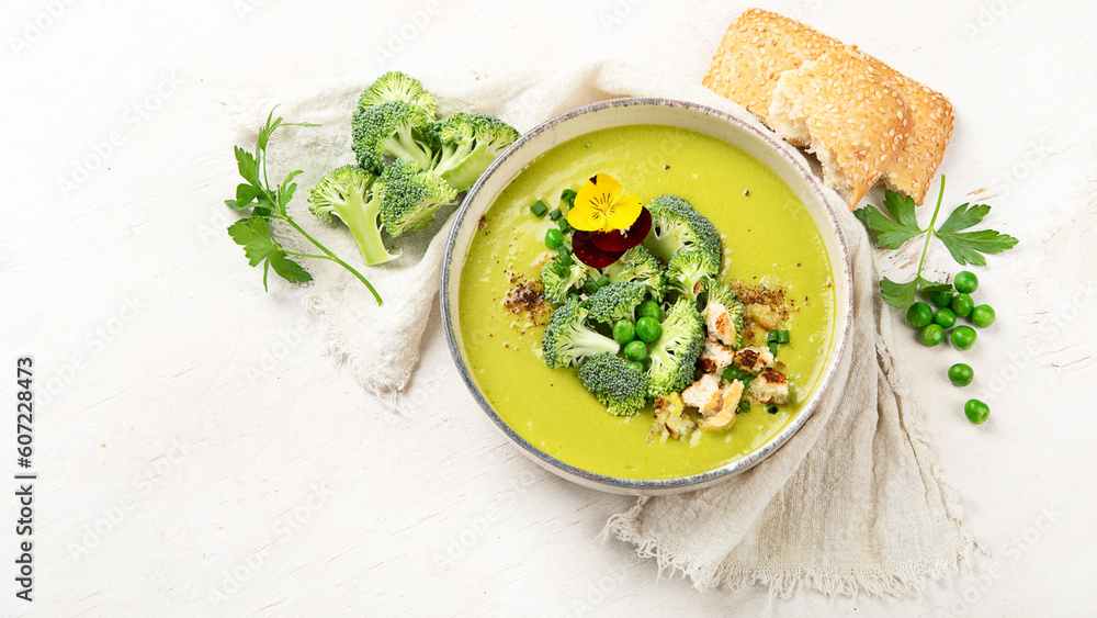 Green soup. Broccoli cream soup. Healthy vegan dish. Top view Green soup. Broccoli cream soup. Healthy vegan dish. Top view