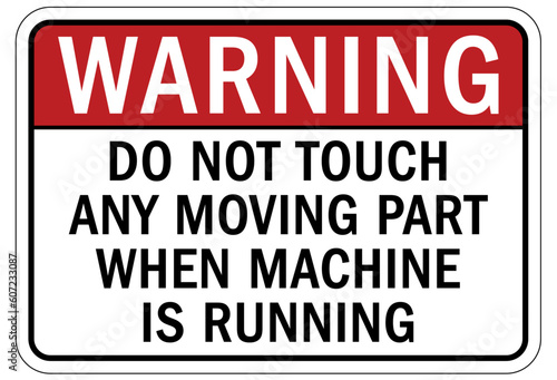 Moving machinery warning sign and label do not touch any moving part when machine is running