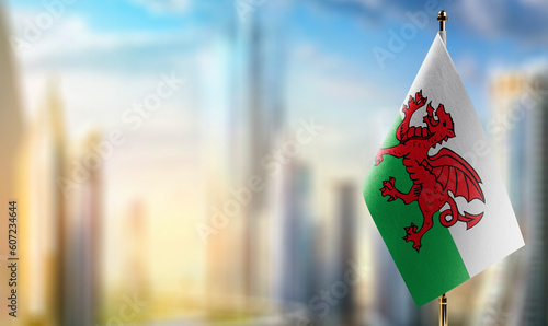 A small Wales flag on an abstract blurry background