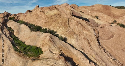 Aerial shot of the unique and iconic Vazquez rocks which provide a magnificent otherworldly terrain that is often used for filming due to the unique rock structures photo