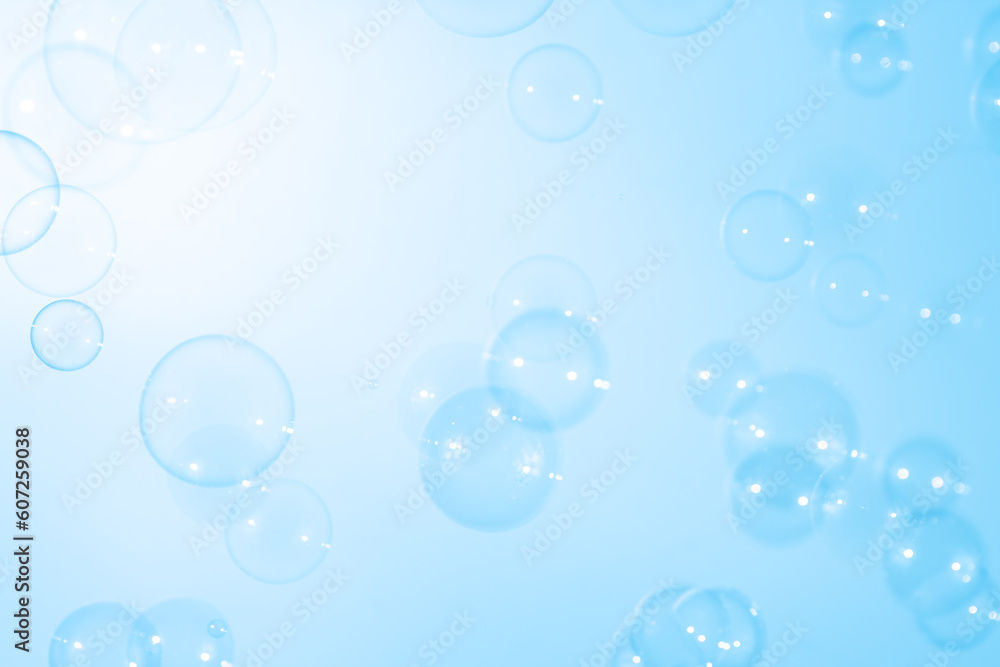 Beautiful Defocused Transparent Blue Soap Bubbles. Abstract Background. White Space. Celebration Festive Backdrop. Freshness Soap Suds Bubbles Water