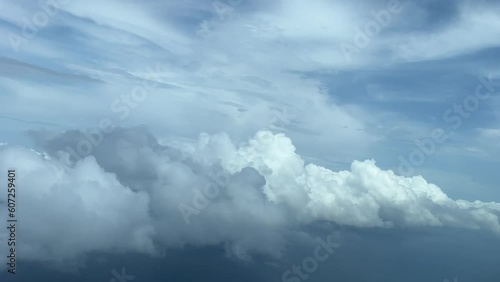 A pilot’s point of view while flying through a stormy sky doing a left turn to avoid bad weather ahead. 8000m high. photo