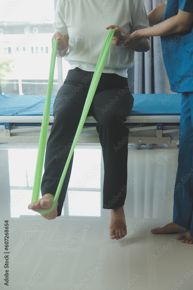 Physiotherapist working with patient in clinic, closeup Physiotherapist working with patient in clinic, closeup